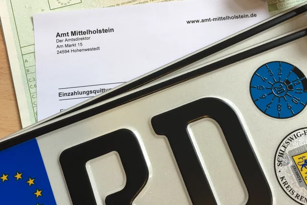 Bild Zulassungspapiere und Kennzeichen Bild Zulassungspapiere und Kennzeichen